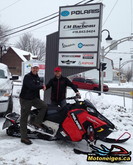 On the right, Christian Barbeau, owner of CM Barbeau, Polaris dealer in northern Greater Québec, with Marc Thibeault from SledMagazine.com and the new 2015 Polaris 800 H.O. Switchback PRO-S
