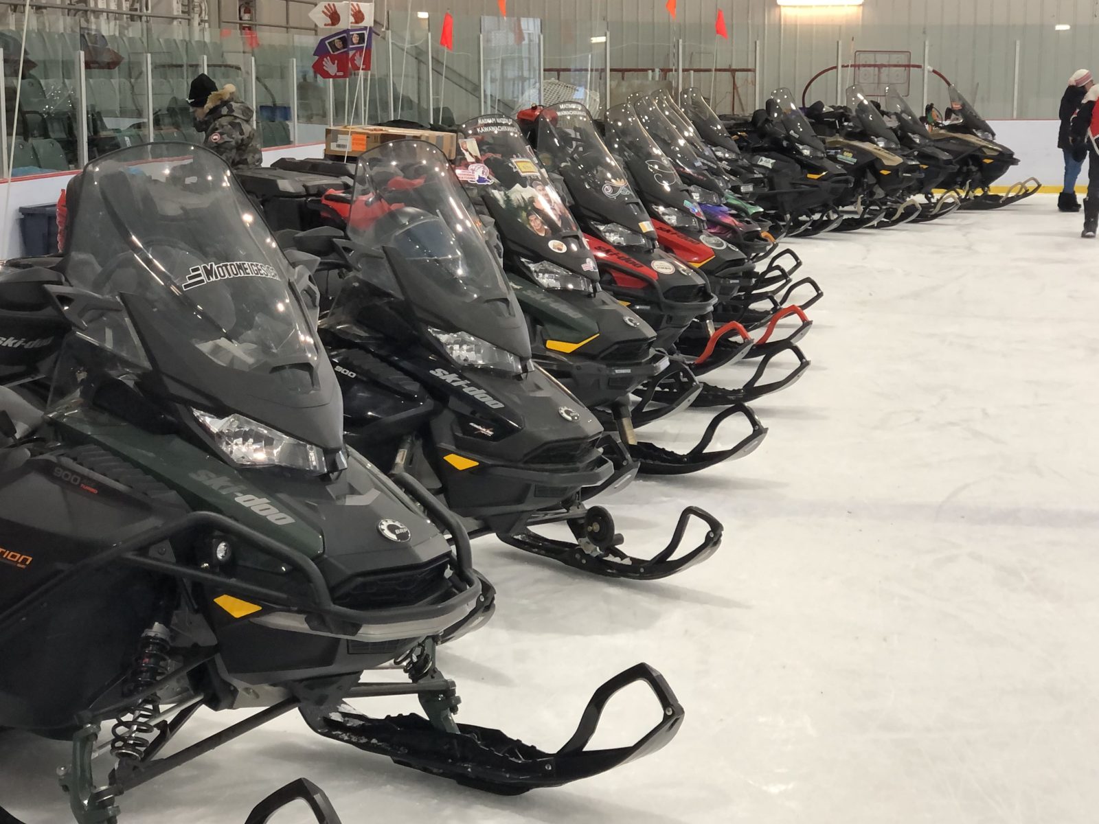 snowmobiles are parked in the local arena until the big launch of the first nations expedition