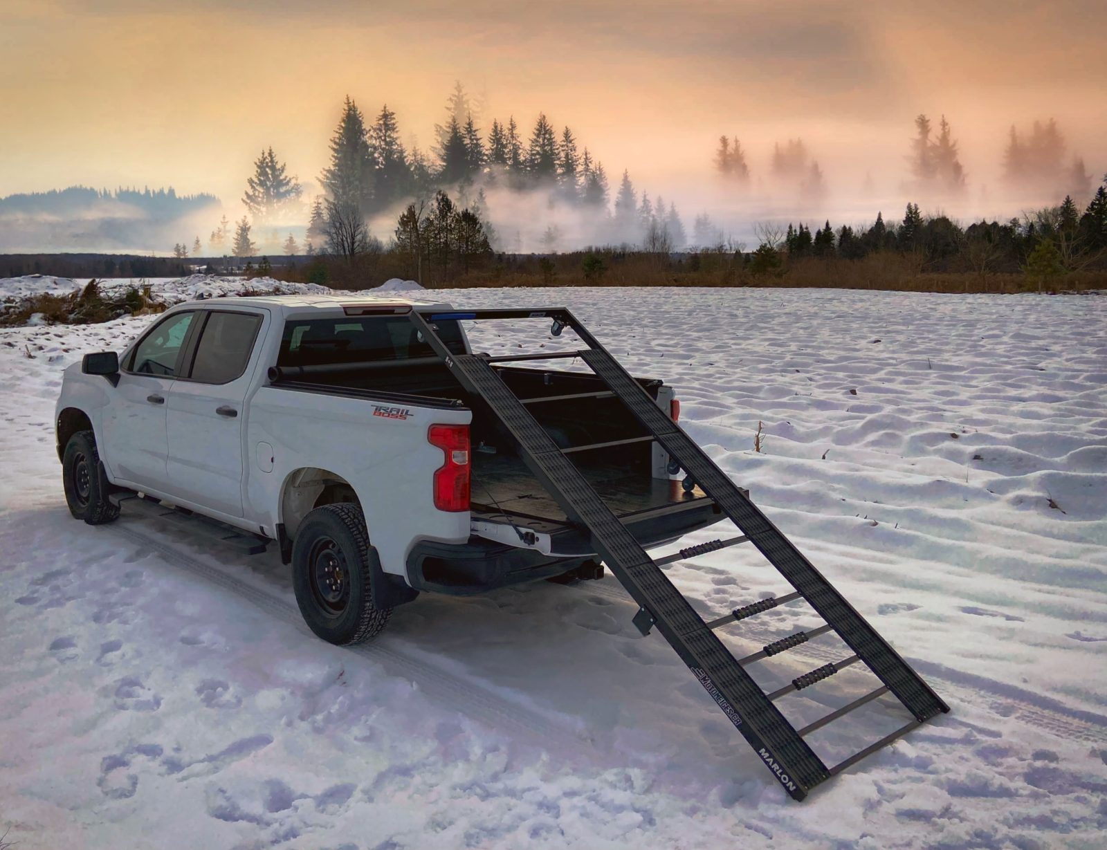 single loader ramp ready to transport a snowmobile